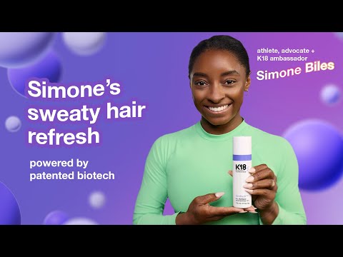 Olympic Gymnast, Simone Biles, holding airwash dry shampoo.