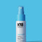 K18 AstroLift hair spray bottle on a blue background